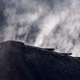 Steam rising from the thatched roofs_1