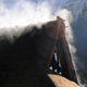 Steam rises from a thatched roof_1